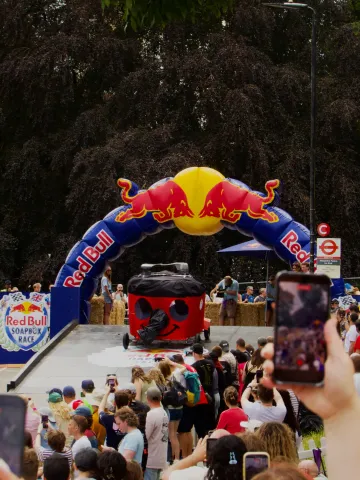 A soapbox kart based on Henry the Hoover rolling down Alexandra Palace during the Red Bull Soapbox Race.