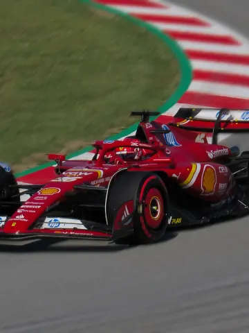 Charles Leclerc going through turns 11 and 12 at the Circuit de Barcelona-Catalunya during the 2024 Spanish Grand Prix.